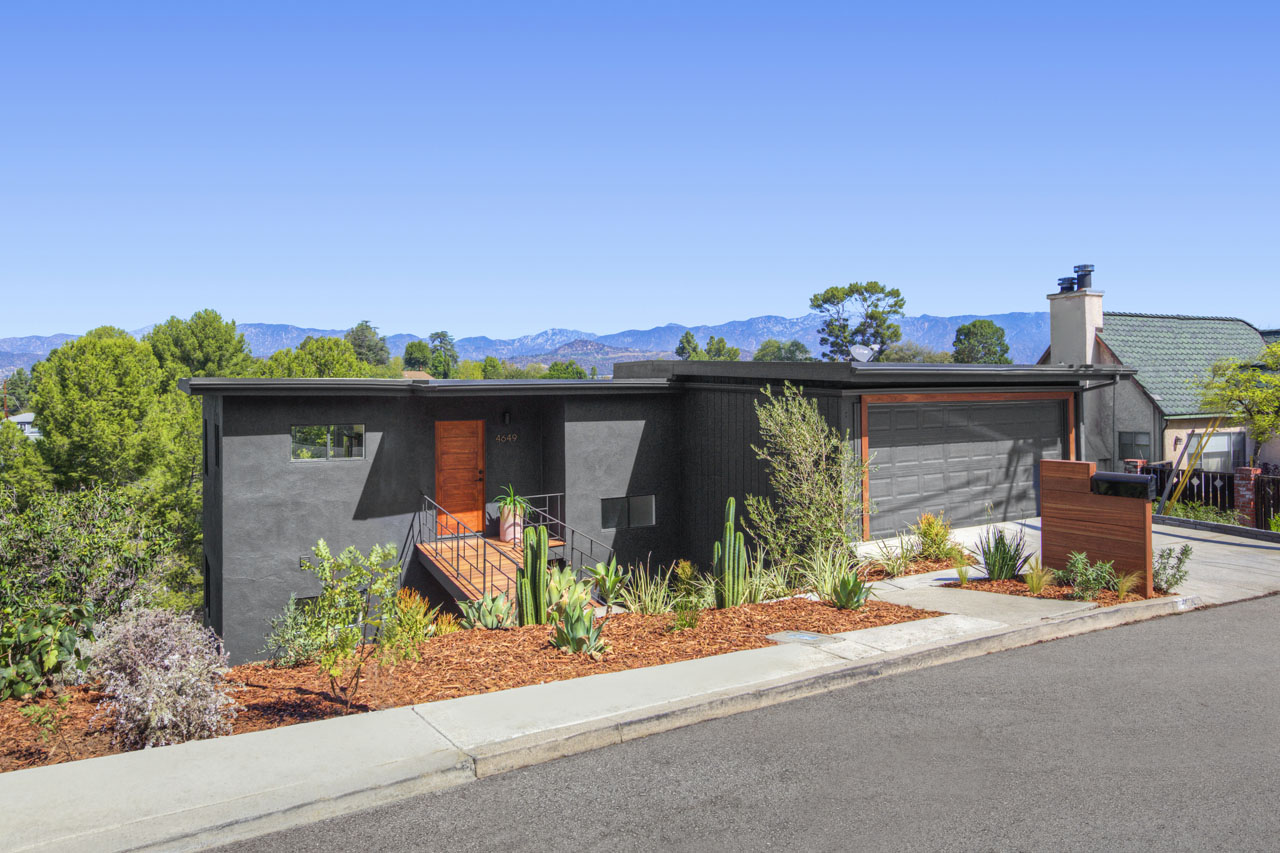 An exterior image of the mid-century home 4649 Nob Hill Dr
