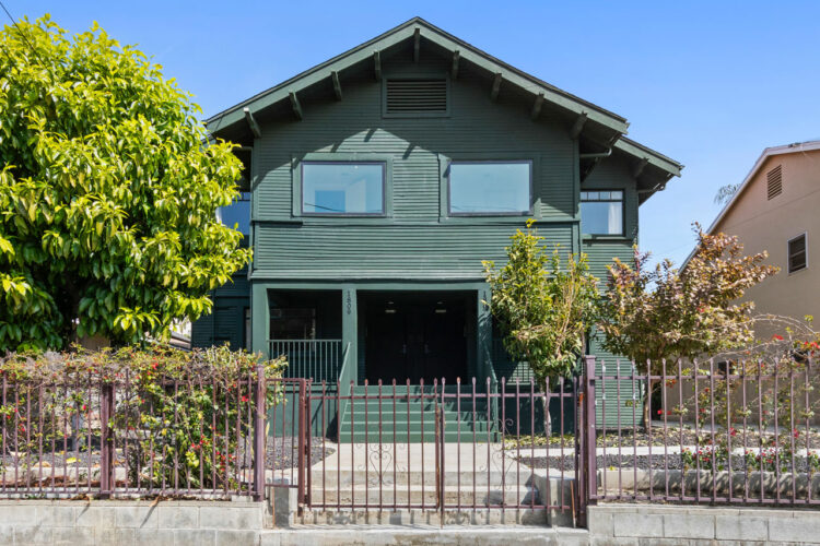 green two floor traditional four plex in echo park