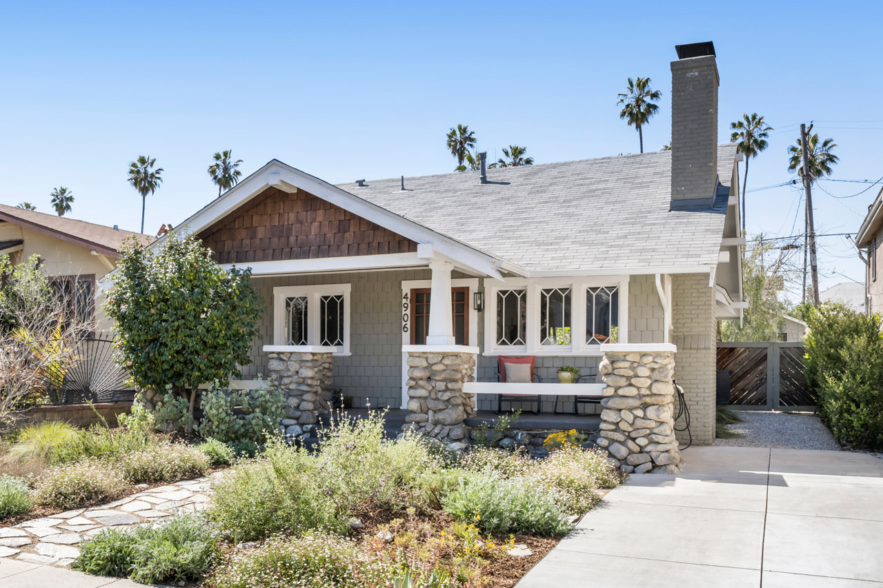 exterior of a highland park bungalow with drought tolerant landscaping