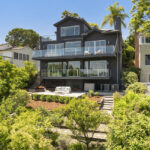 exterior of a three story contempirary home