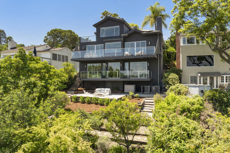 exterior of a three story contempirary home