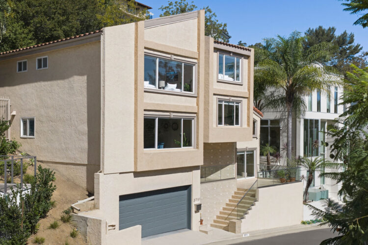 3751 Prestwick Dr Los Feliz, Contemporary Hillside Home for Sale Three stories, beige and with a grey garage door