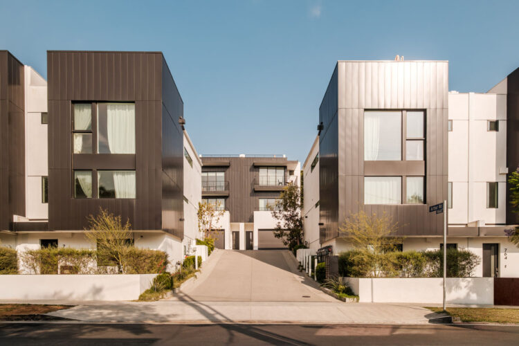 760 N Arthur Aver 90029 Silver Lake image of a contemporary new home community, three level buildings with white and black details a concrete entryway and green plants